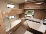 There's also a bright, child-friendly rear lounge which can be partitioned off from the rest of the van – each fixed bunk gets its own window