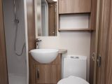 A Thetford electric flush loo features in the 590's compact washroom