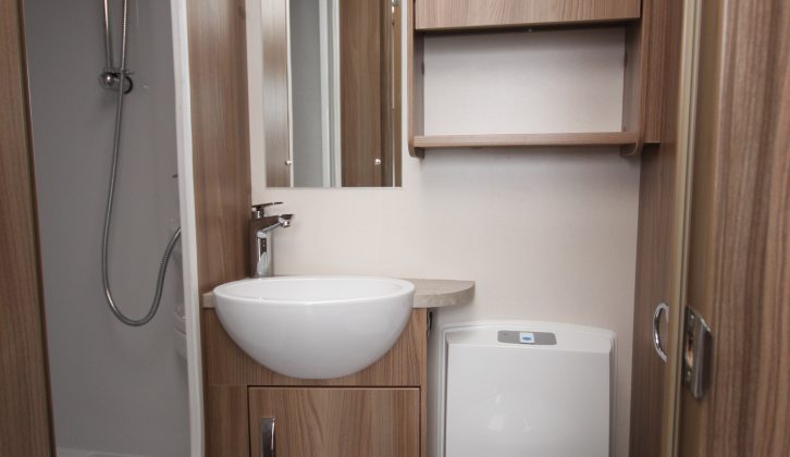A Thetford electric flush loo features in the 590's compact washroom