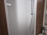 The fully lined, separate shower cubicle has an Ecocamel Orbit showerhead