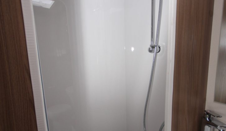 The fully lined, separate shower cubicle has an Ecocamel Orbit showerhead