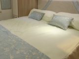 The master suite with this transverse island bed and the central washroom are standout features in the 2016 Lunar Delta RI – watch our show and see them yourself