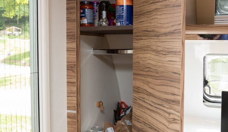 There's lots of storage in the kitchen – and note the concertina flyscreen, part of the standard-fit Anniversary Pack
