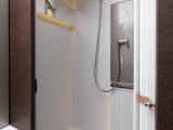 There's even ambient lighting in the shower, which sits in its own cubicle, behind a bi-fold door