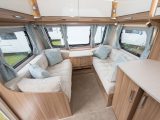 The light lounge has sumptuous upholstery and an attractive colour scheme, but the sofas are short for a twin-axle van