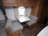 There are good-sized cupboards above the dinette which converts into bunks, 1.76m x 0.59m on top, 1.80m x 0.62m on the bottom