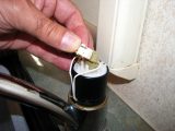 Make a note of the position of all parts. Next remove the old microswitch and disconnect