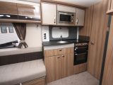 A dual-fuel hob, a microwave and a separate oven and grill all feature in the Swift Conqueror 650's kitchen