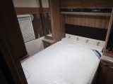 The retractable island bed is 1.82m x 1.33m, flanked by wardrobes – the Swift Conqueror 650 has a great rear bedroom