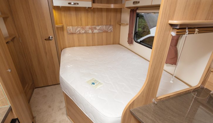 The comfortable double bed (1.91m x 1.37m) has good storage options around it