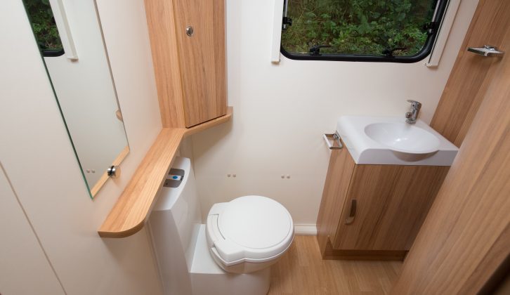 The Bailey Pursuit 430-4's end washroom is a good size and has an electric-flush toilet and a stylish sink