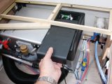 Check that the electrics are off, then strip the furniture to aid access and remove cover panel