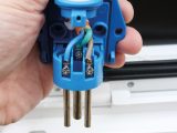 Unscrew the external mains connector, remove cover and note where each wire is connected