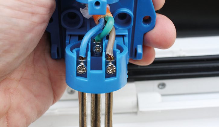 Unscrew the external mains connector, remove cover and note where each wire is connected
