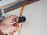 Separate the brown wire and pass through the load monitor. Check all the wires for damage