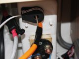 Mount the monitor securely, feed the cable out and tidy with cable-ties and insulating tape