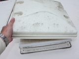 If you only want to wash the caravan's pop-up rooflight, remove the four screws and washers, then take off the outer cover