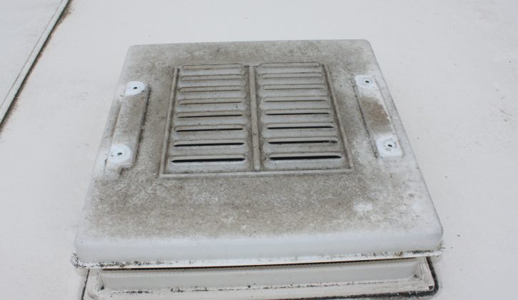 Remove the grubby inner cover of the rooflight. These are light, so keep hold of them in the breeze!