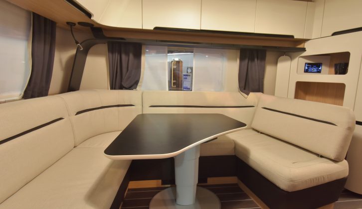 Overhead lockers mean there's plenty of storage, the yacht-style seating and timber flooring design come straight from the Caravisio, and a sound system is mounted in the open lockers in this rear lounge