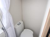 There's a Thetford electric flush toilet in the rear offside corner of the Coachman Vision 380's bathroom