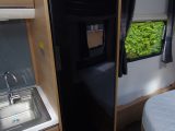 A full-height slimline fridge/freezer also features – read more in the Practical Caravan Adria Adora Isonzo 613DT Silver Collection review