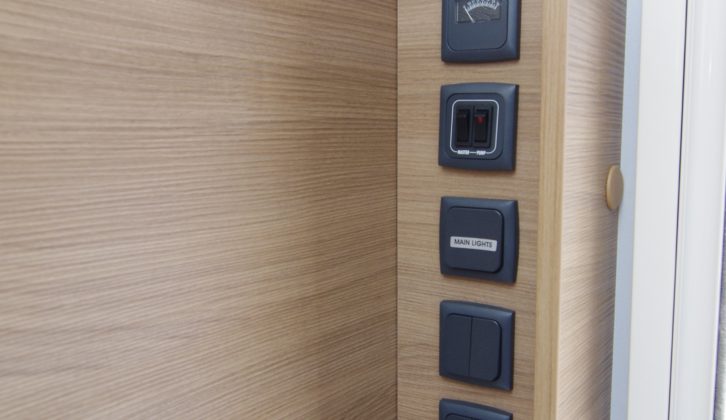 In the Adria Adora Isonzo 613DT Silver Collection, the control panels, light switches and TV points are handily located just inside the entrance door