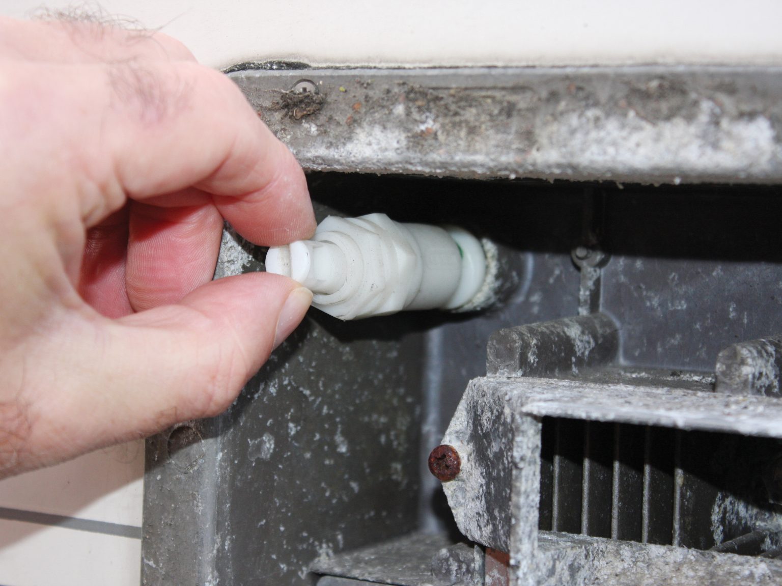 How to clean a Carver Cascade GE water heater's burner Practical Caravan