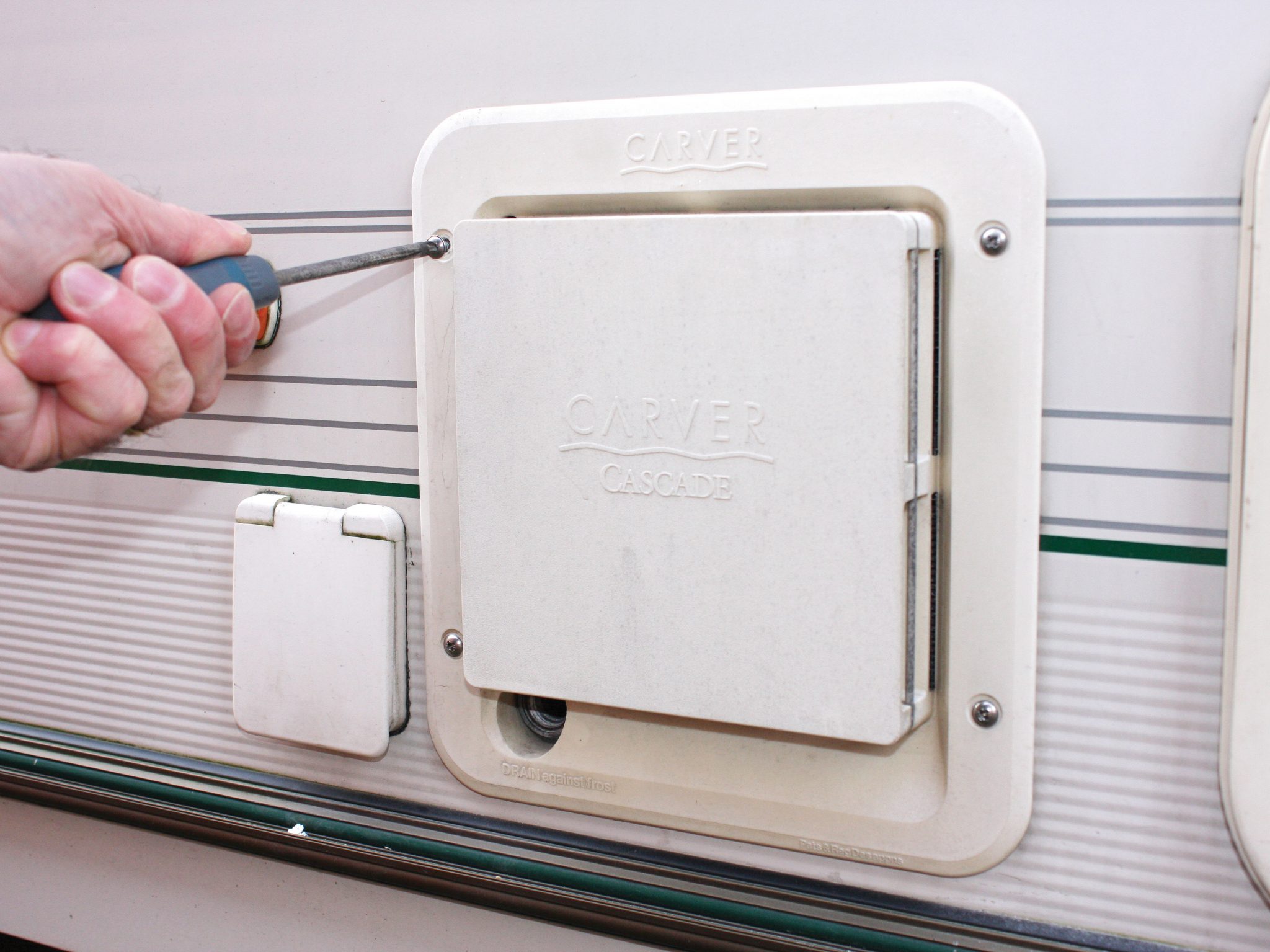 How to clean a Carver Cascade GE water heater's burner Practical Caravan