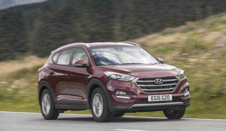We've already tested the Hyundai Tucson with and without a caravan in tow – how will it compare to the mechanically similar Kia Sportage?