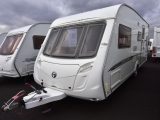Another option: this 2006 Swift Challenger 490/5 has a similar level of kit, a dinette at each end and costs £7995