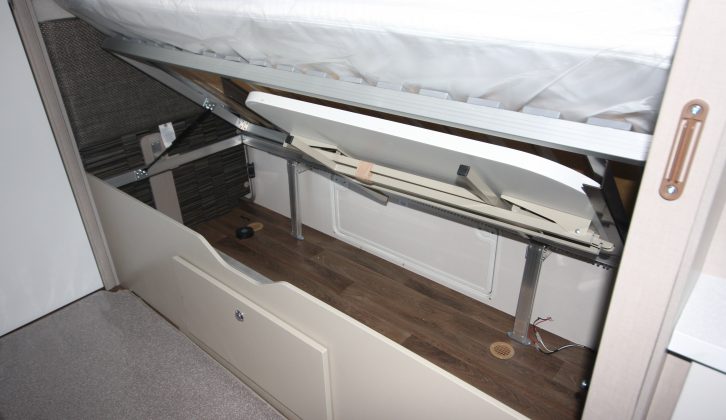 There's decent storage under the fixed beds, the nearside one with external access – read more in the Practical Caravan Sterling Eccles 565 review