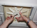Line up the flats of the fan’s hole with the spindle’s and fit the nut. Don’t over-tighten