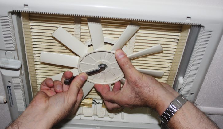Line up the flats of the fan’s hole with the spindle’s and fit the nut. Don’t over-tighten