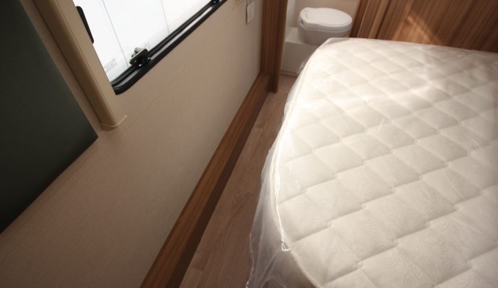 With the bed in day mode, access to the full-width end washroom is not too difficult