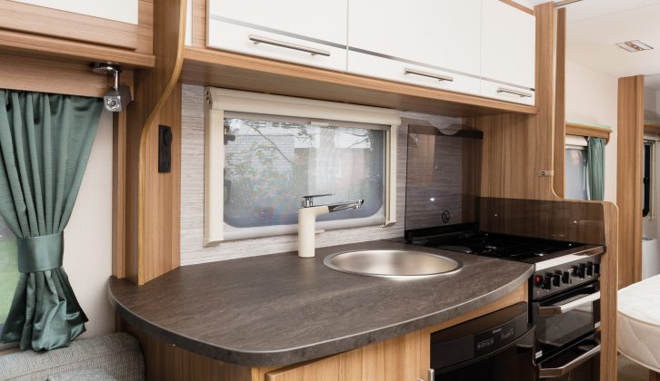 The Lunar Quasar 574's light, airy kitchen has a good worktop space beside the sink as well as on the dresser opposite