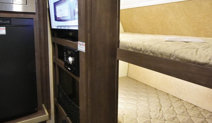 The American R-pod RP-176 caravan has fixed bunk beds, measuring 1.88m x 0.54m