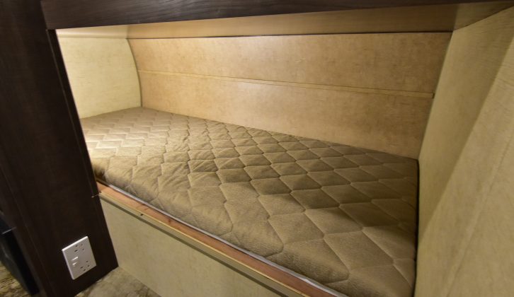 The bunk beds offer good headroom and reading lights, but no windows