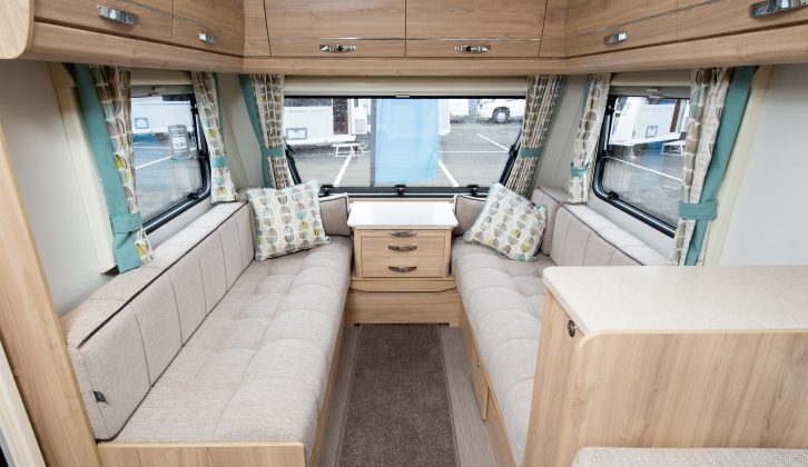 The lounge is light thanks to the midi-Heki rooflight and the large single window across the front of the van
