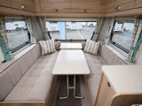 You can seat six at mealtimes, although if two occupants use the side dinette, it is more comfortable