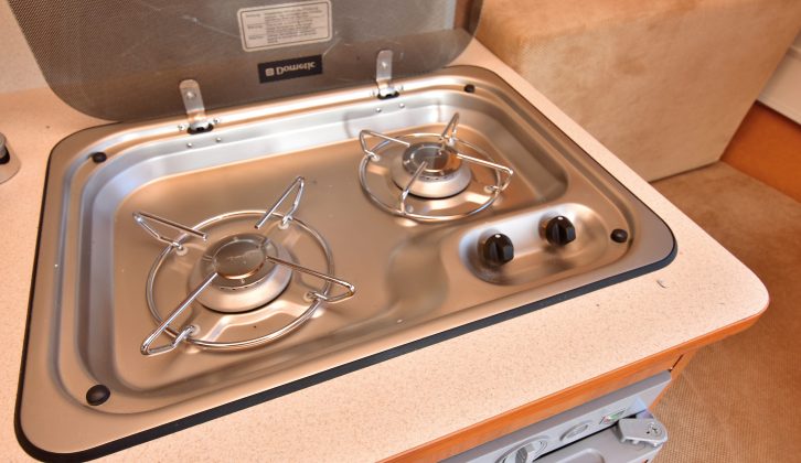 The glass-lidded, two-burner gas hob is the only cooking appliance in the Freedom Microlite Bijoux