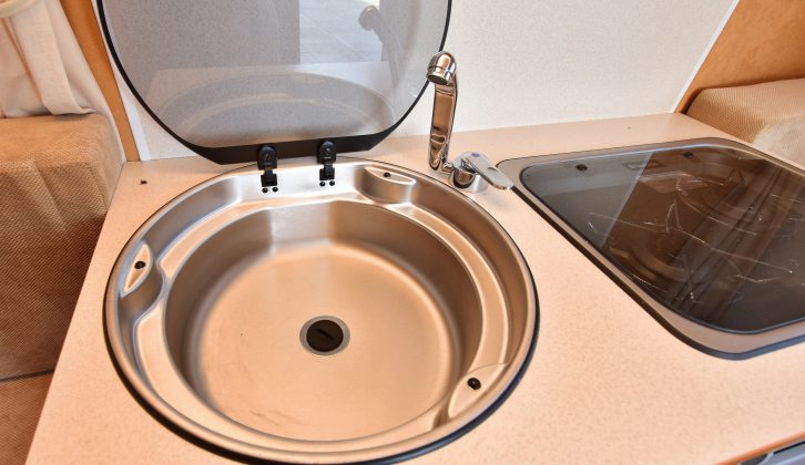 In the Freedom the stainless-steel sink has a lid, but there's no hot-water feed, just a cold tap