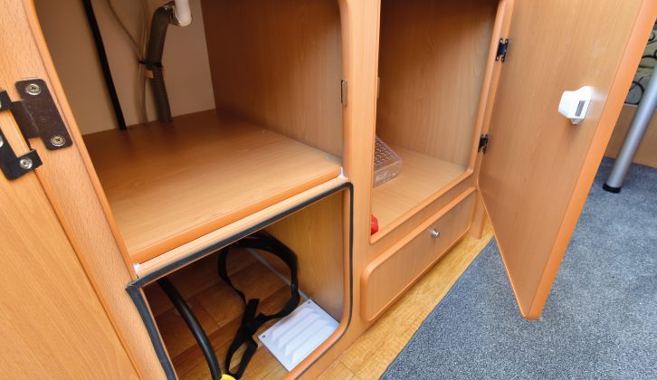 Despite the gas locker being below the sink, there's room for two good store cupboards in the Go-Pod