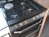 You get a separate oven and grill, and a dual-fuel hob with three gas burners