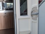 There's a bin and a window in the Swift Conqueror 580's door