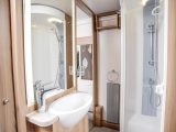 The Swift Conqueror 560's washroom is light, bright and feels deceptively spacious