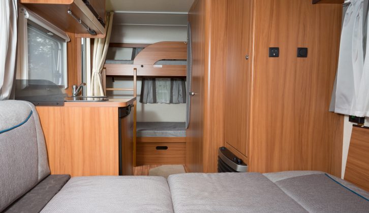 Looking from the front towards the rear of the van, it's clear how this transverse-bunk layout makes good use of the space and could be great for families