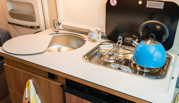 The kitchen is compact and has few of the cooking appliances that British caravanners expect