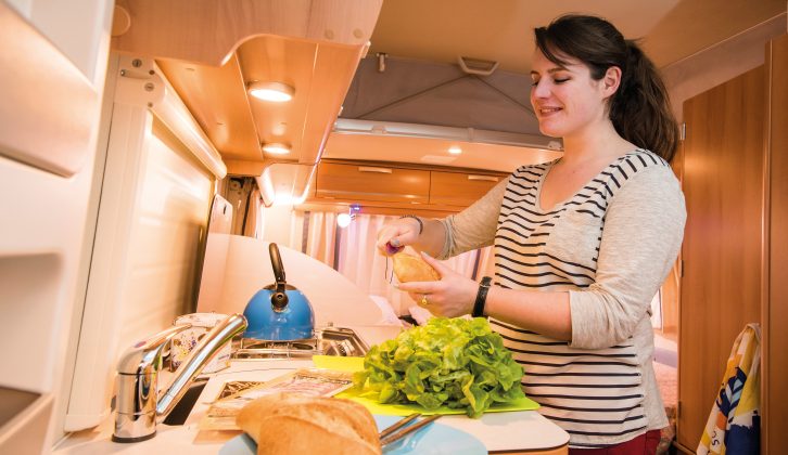 A sink cover and extension flap boost the kitchen worktop space