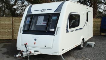 With its front lounge/bedroom and a rear washroom, this Compass Corona 462 is a classic two-berth