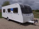 The 2016 Bailey Pegasus Brindisi boasts an end washroom and a transverse island bed
